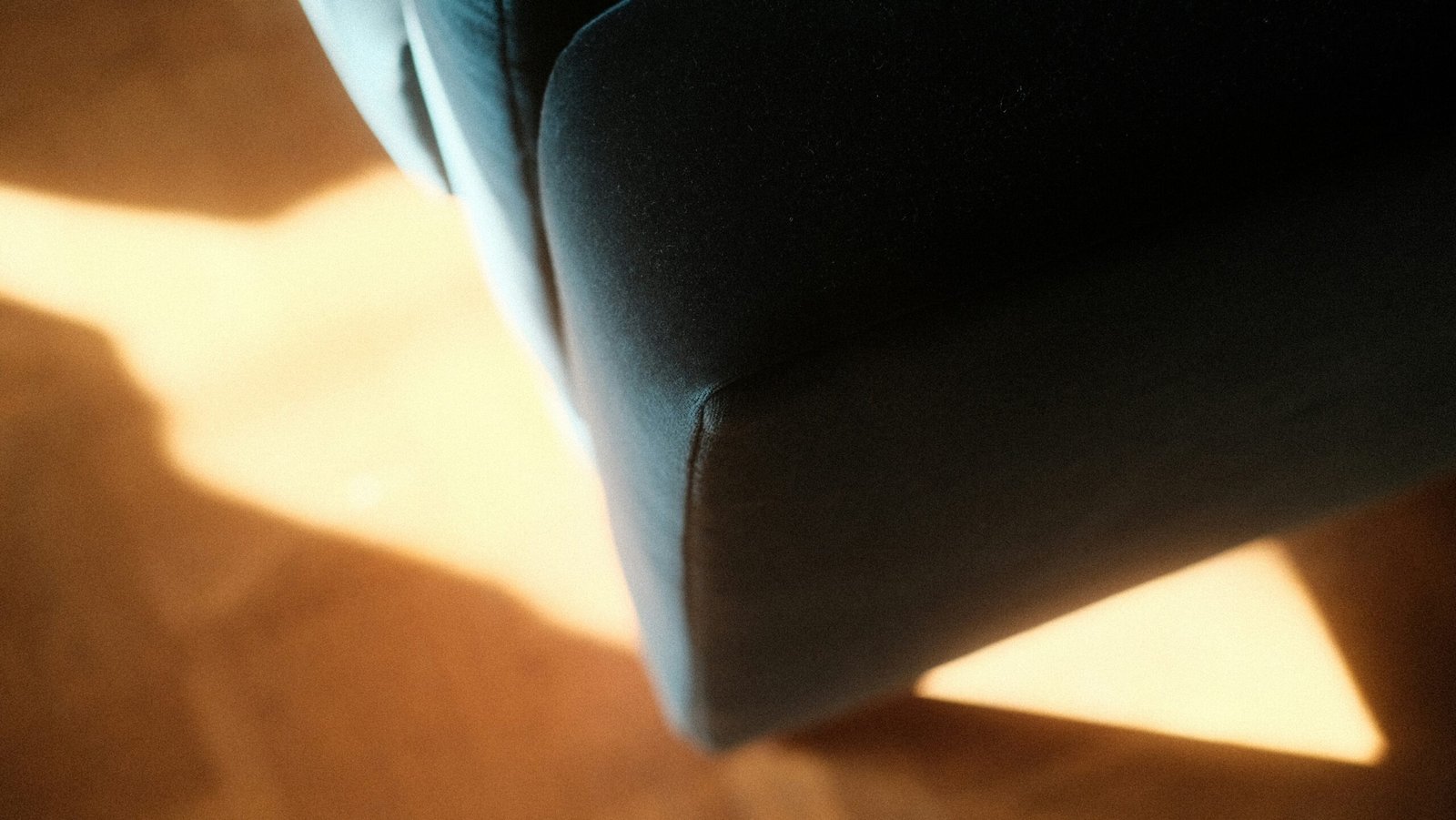 black textile on brown wooden table