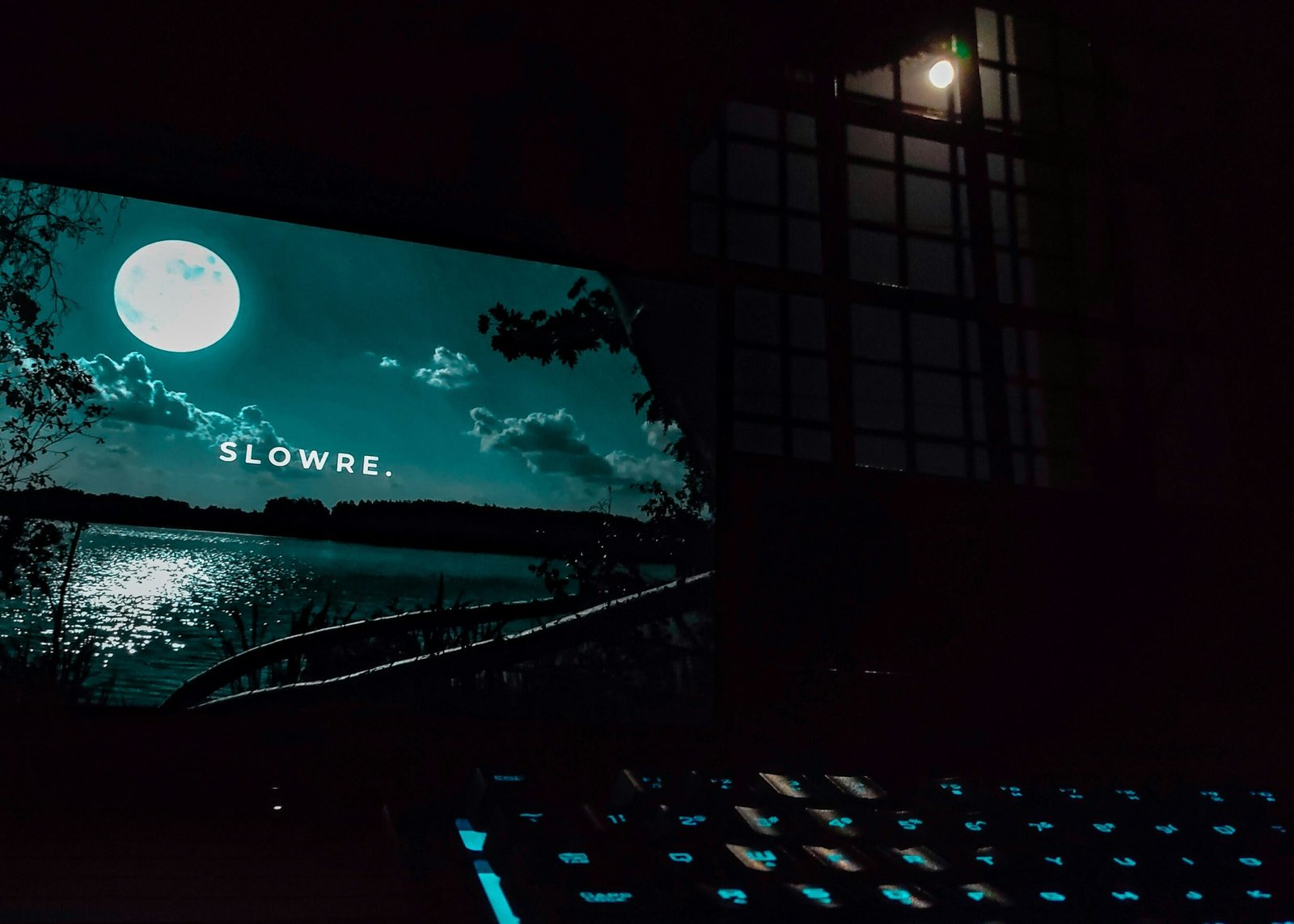 A computer keyboard sitting on top of a desk