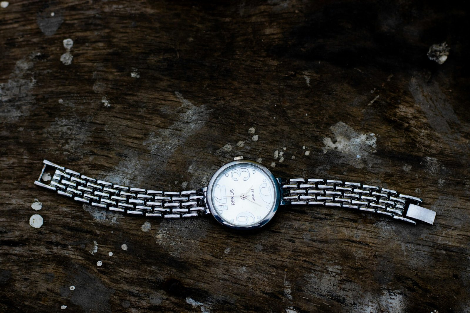 silver and white analog watch