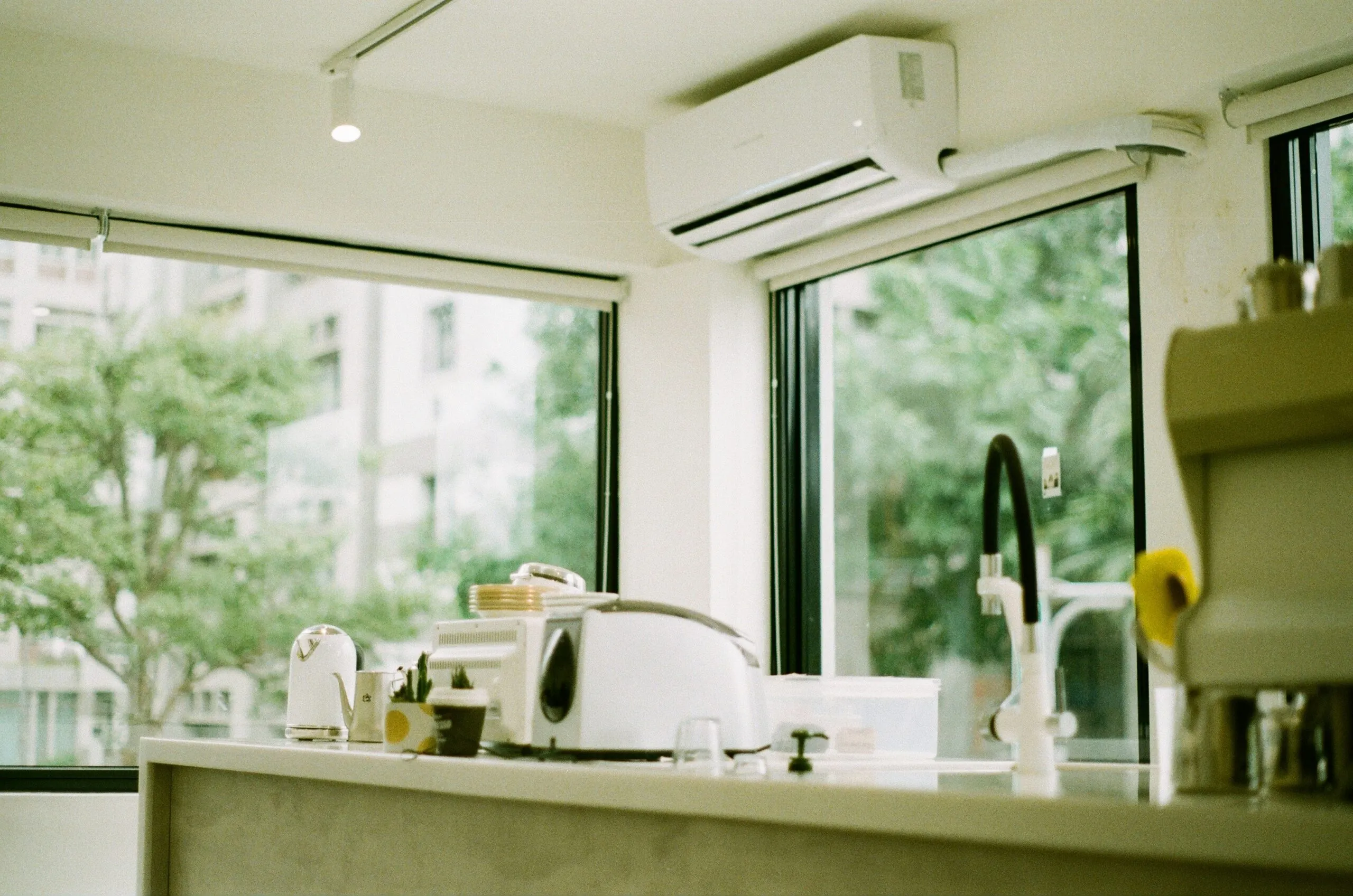 a kitchen counter with a toaster on it