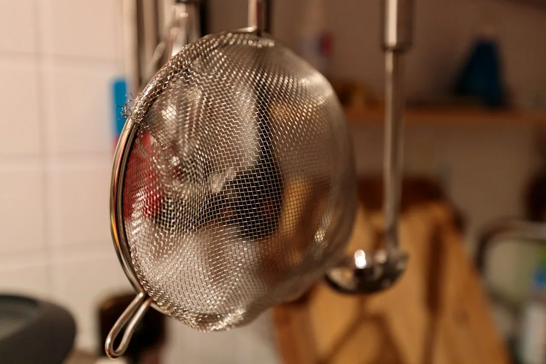 A kitchen scene with focus on the frying pan