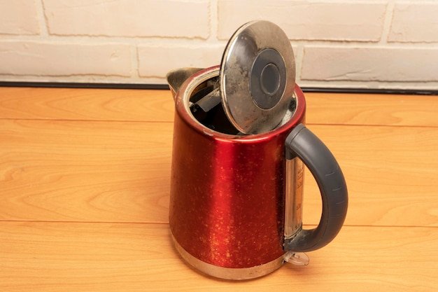 A broken old used electric kettle Kitchen Accessories High quality photo