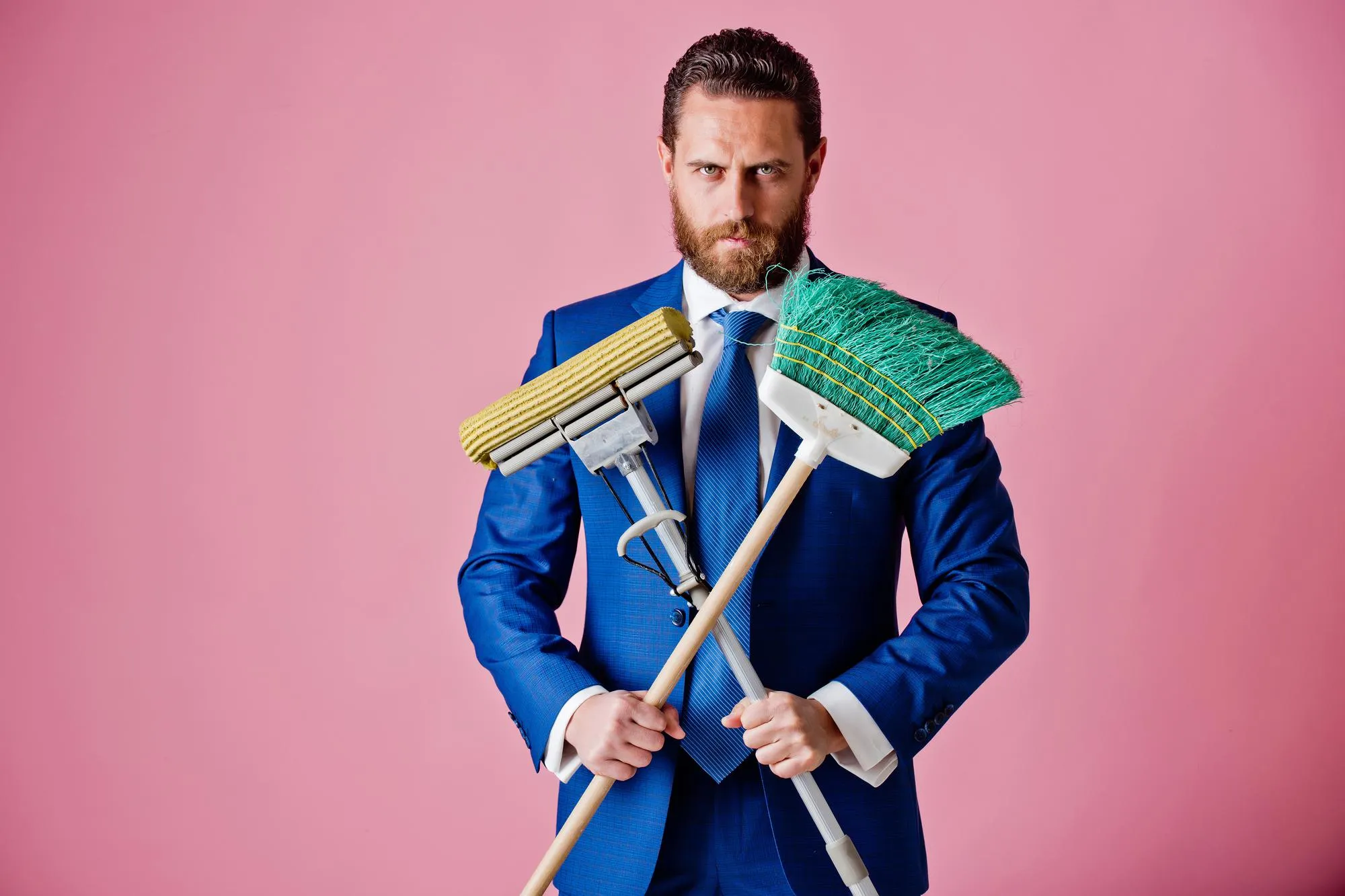 Business and home, fashion, handsome man or businessman with broom