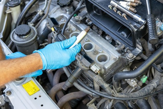 Car spark plug replacement repairing of vehicle