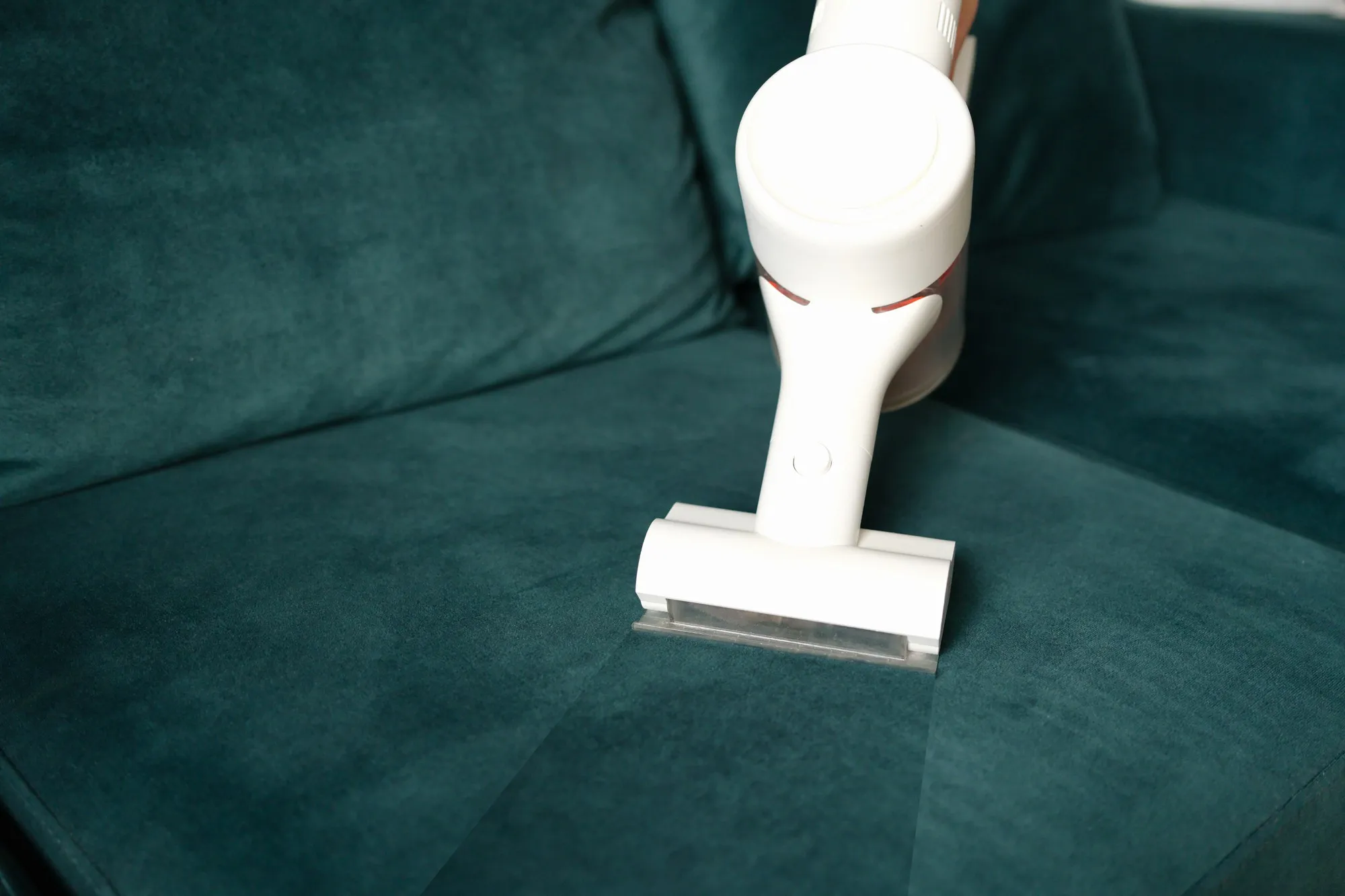 Clean fabric upholstery with white vacuum cleaner household appliances for cleaning furniture