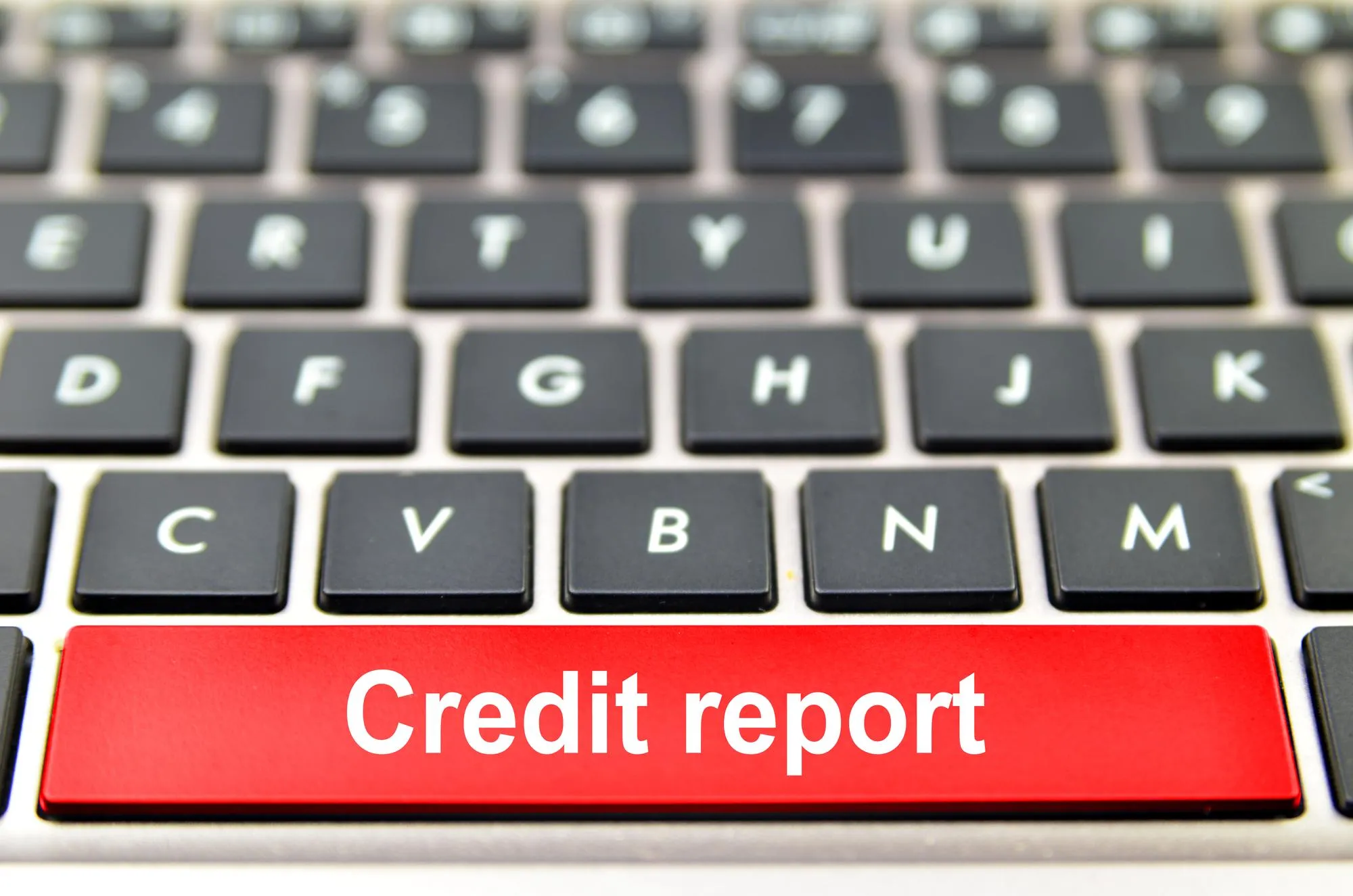 Credit report word on computer space bar