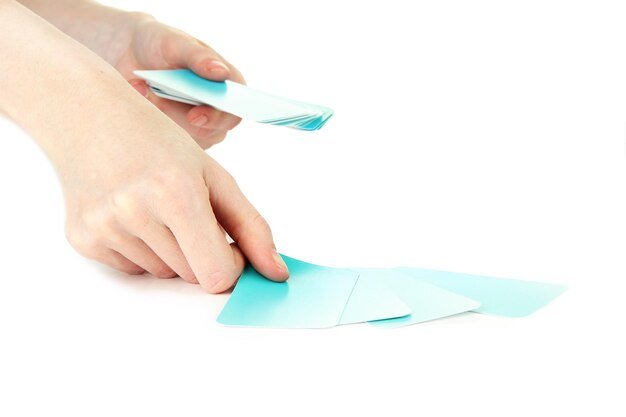 Hand with business cards Concept Business like poker game Isolated on white