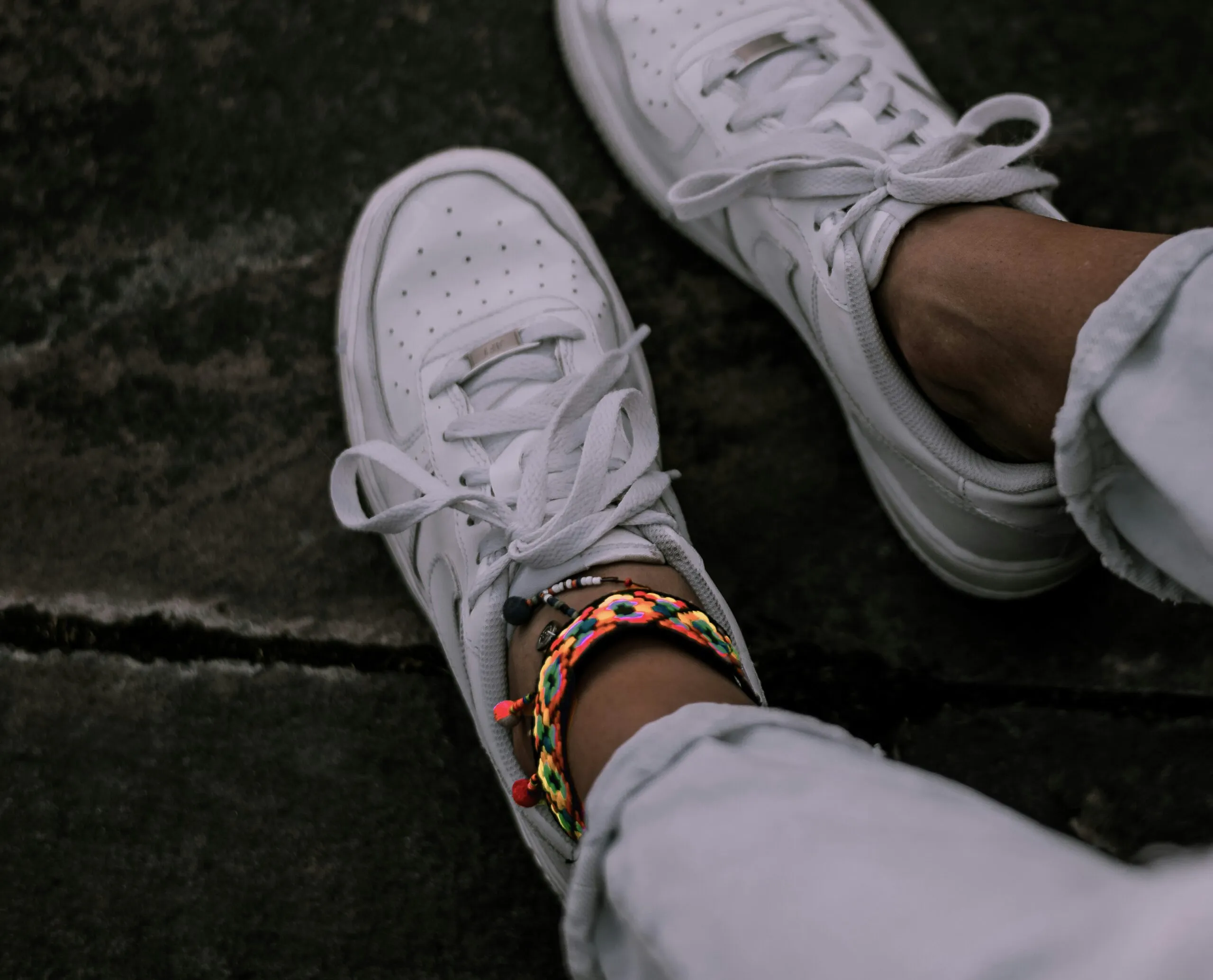 pair of white low-top sneakers