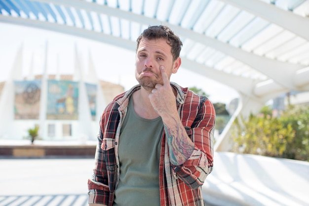 Looking desperate and frustrated sad unhappy and crying