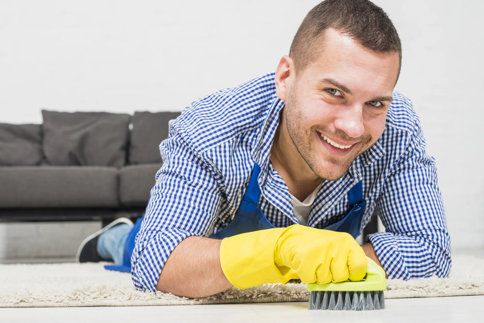 Man cleaning his home