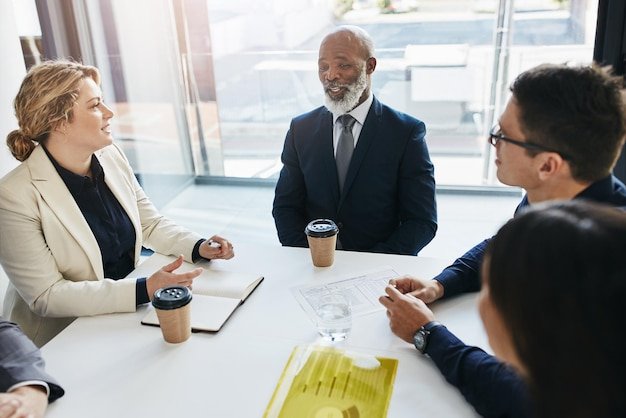 Meeting corporate and business people in boardroom for discussion project development or collaboration Consulting agency diversity and employees in office for conversation planning or ideas