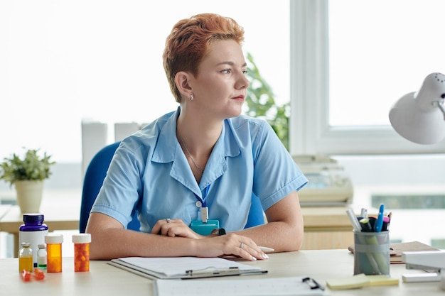 Pensive Young General Practitioner