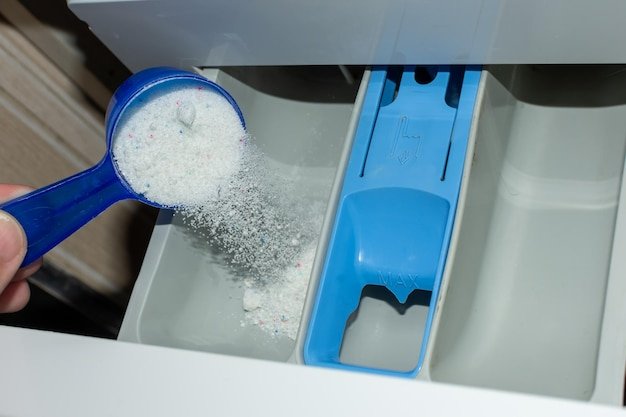Pour laundry detergent into the washing machine compartment