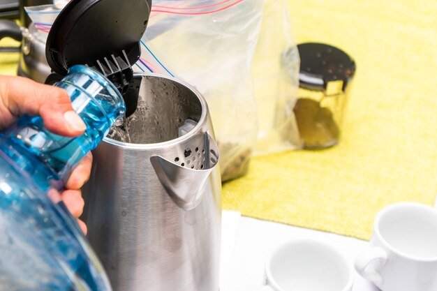 Professionally preparing coffee during a cupping event