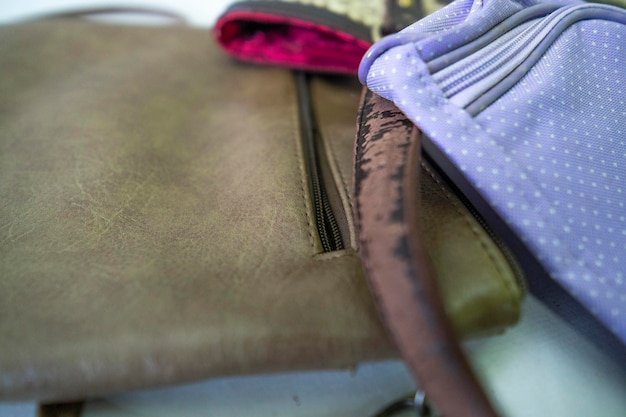 Various bags with handle and zipper details