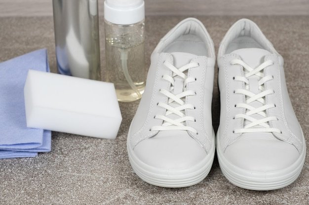 White leather shoe cleaning kit waterrepellent spray foam rag and sponge