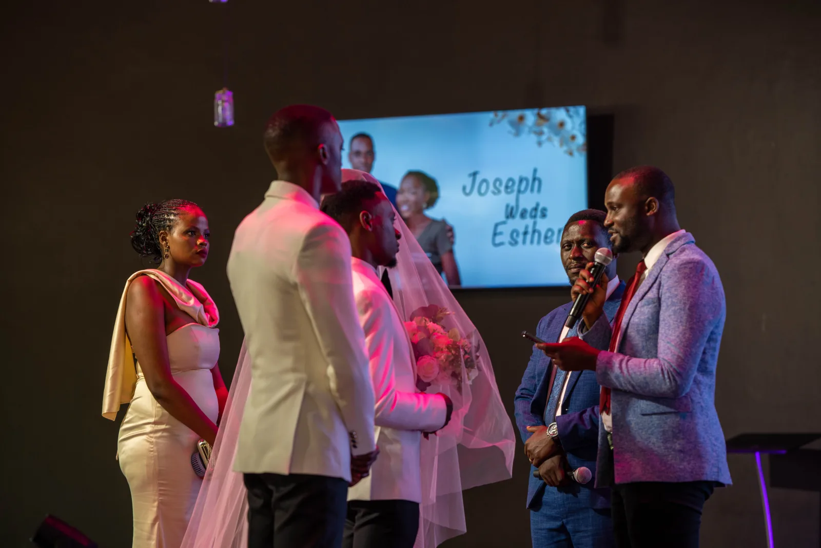 The moment when the groom presents the bride before the pastors to exchange vows, while the best man and matron stand as witnesses, is one of the central rites within a wedding ceremony. It symbolizes the public declaration of commitment, where the couple formally prepares to enter into marriage before faith leaders, family, friends, and the wider community. In many Christian wedding traditions, presenting the bride before the pastors signifies readiness to make sacred promises to one another.