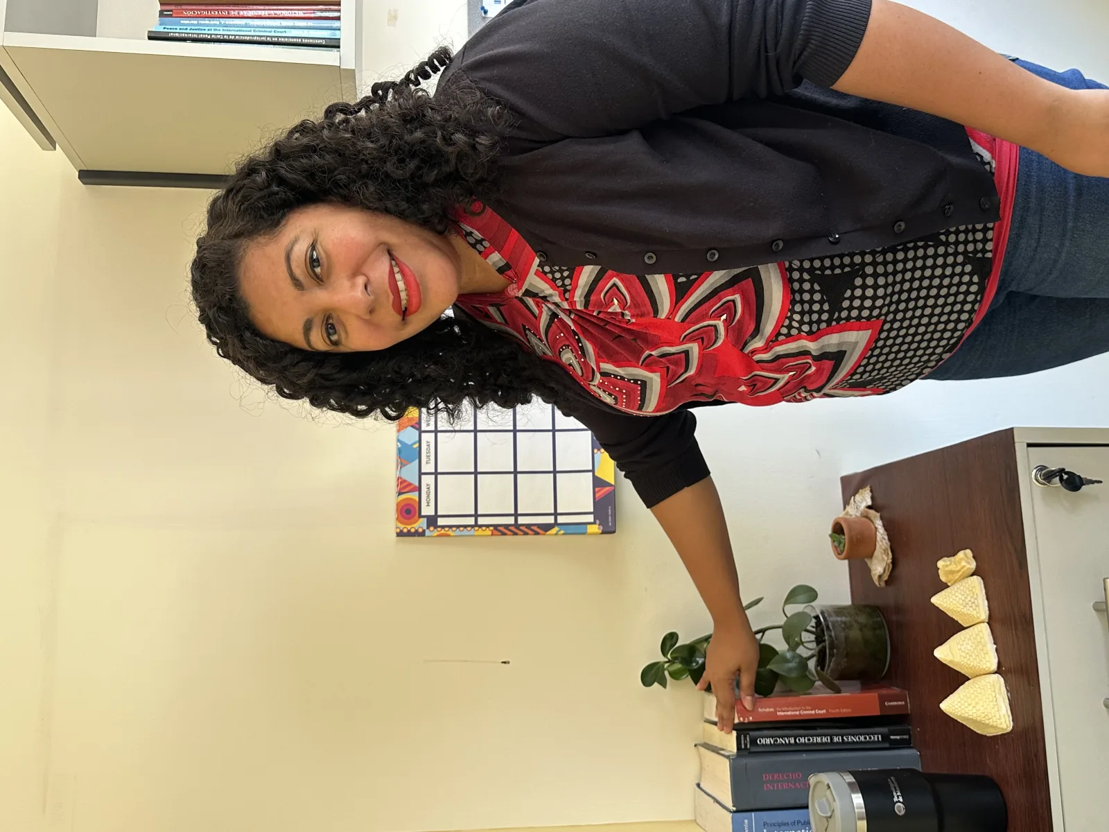 This original photograph shows a Latina woman in an educational and professional setting, representing leadership, visibility, and empowerment. The image highlights the importance of giving more recognition to women who contribute through knowledge, guidance, and community engagement.