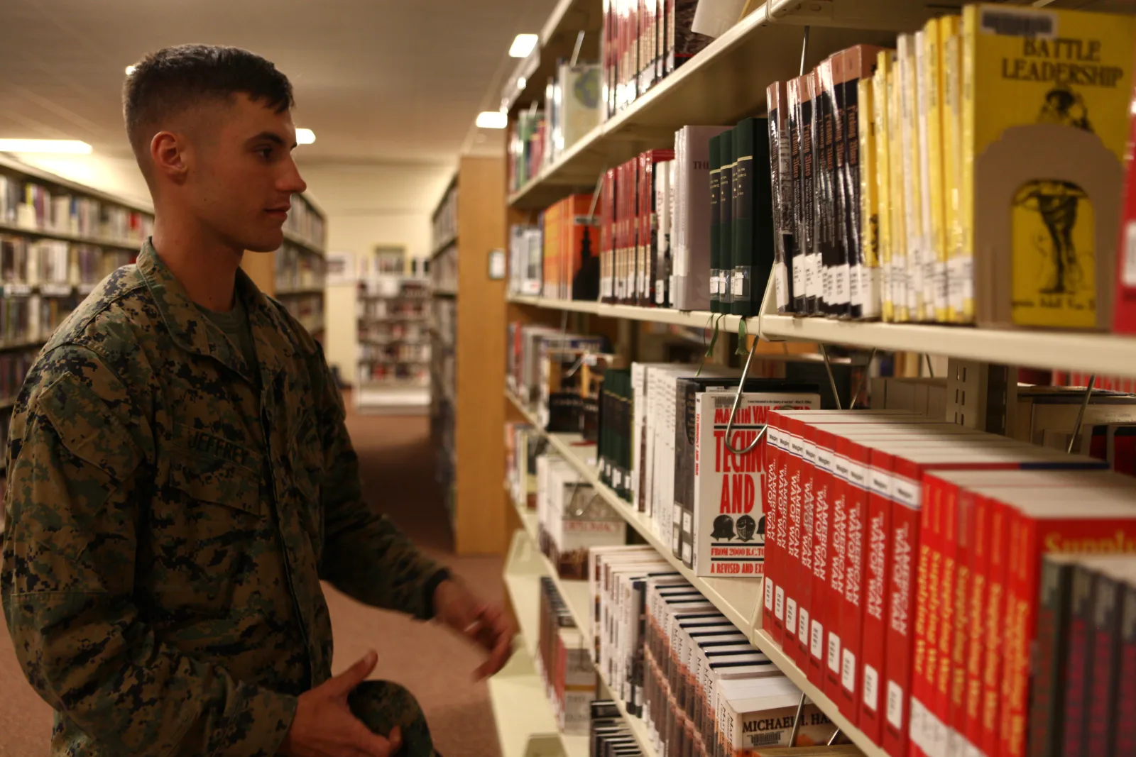 Lance Cpl. Sterling Jeffrey, a data network specialist with Marine Wing Communications Squadron 38 and a Springdale, Ark., native, looks through the Commandant’s Reading List section at the station library aboard Marine Corps Air Station Miramar, Calif., Feb. 27. Books can help a Marine’s career, though many Marines may not consider the Commandant’s Reading List as a possible boost for promotion.
Unit: Marine Corps Air Station Miramar / 3rd Marine Aircraft Wing
DVIDS Tags: Library; MCAS Miramar; Marine Corps Air Station Miramar; Marine Wing Communications Squadron 38; Commandant's Reading List; Marine Corps Professional Reading Program; Marines career