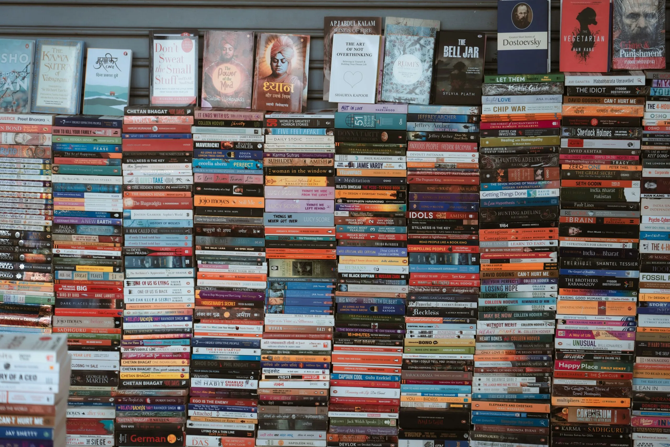 Wall of books with colorful spines
