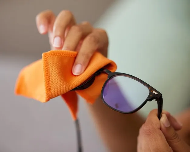 Now I can see clearly again Shot of an unrecognizable person cleaning glasses at home