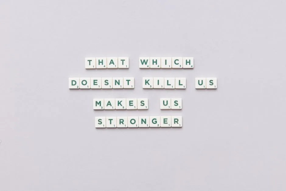 Inspirational quote using Scrabble tiles on a light background, perfect for motivational content.
