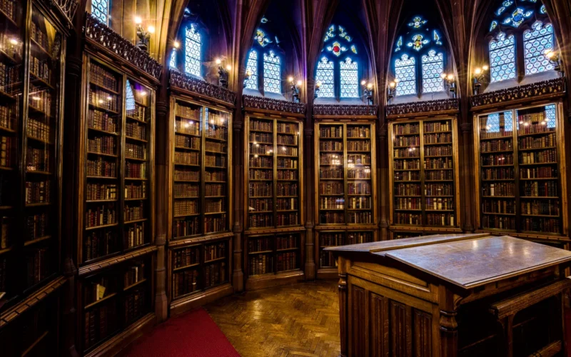 Here is an hdr photograph taken from an enclosure inside the reading room at The John Rylands Library. Located in Manchester, Greater Manchester, England, UK. The apse of the historic reading room, 1st floor