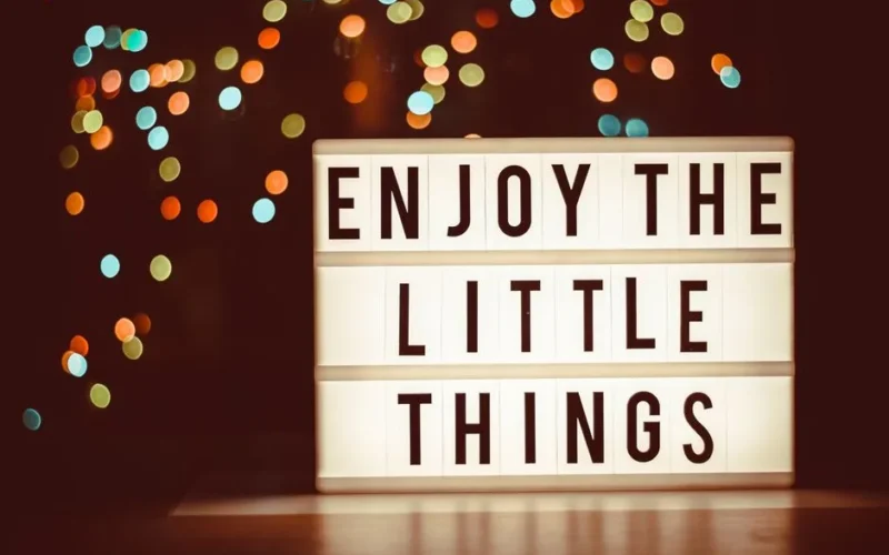 A beautiful lightbox with motivational text and colorful bokeh lights in the background.