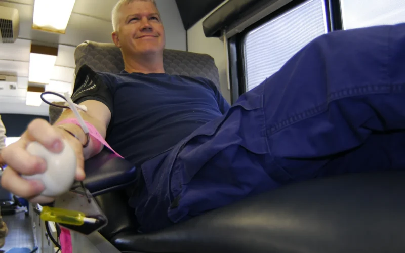 Petty Officer 1st Class Kevin Trahan, a health services technician assigned to Coast Guard Sector Jacksonville, Fla., takes a few minutes out of his day to donate blood to the Blood Alliance, a local non-profit community blood bank, Wednesday, Feb. 25, 2009. The American Red Cross claims only three out of every 100 people in America donate blood. U.S. Coast Guard photo/ Petty Officer 1st Class Christopher Evanson. Unit: U.S. Coast Guard Headquarters DVIDS Tags: Evanson; People; Blood Drive; Sector Jacksonville; Trahan; CGVI; DVIDS Bulk Import