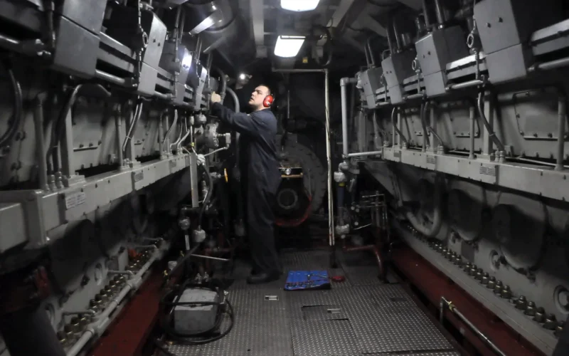 U.S. Navy Chief Engineman Johnnie Lowery performs maintenance on a diesel engine aboard the amphibious transport dock ship USS San Antonio (LPD 17) in the Atlantic Ocean March 18, 2013. The San Antonio was part of the Kearsarge Amphibious Readiness Group and was under way on a scheduled deployment to the U.S. 5th and 6th Fleet areas of responsibility supporting maritime security operations and theater security cooperation efforts.