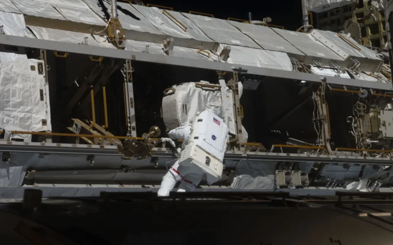Astronaut Joseph Acaba, STS-119 mission specialist, participates in the mission's second scheduled session of extravehicular activity (EVA) as construction and maintenance continue on the International Space Station. During the six-hour, 30-minute spacewalk Acaba and astronaut Steve Swanson (out of frame), mission specialist, prepared a worksite so the STS-127 spacewalkers can more easily change out the Port 6 truss batteries later this year. On the Japanese Kibo laboratory they installed a second Global Positioning Satellite antenna that will be used for the planned rendezvous of the Japanese HTV cargo ship in September. They photographed areas of radiator panels extended from the Port 1 and Starboard 1 trusses and reconfigured connectors at a patch panel on the Zenith 1 truss that power Control Moment Gyroscopes.