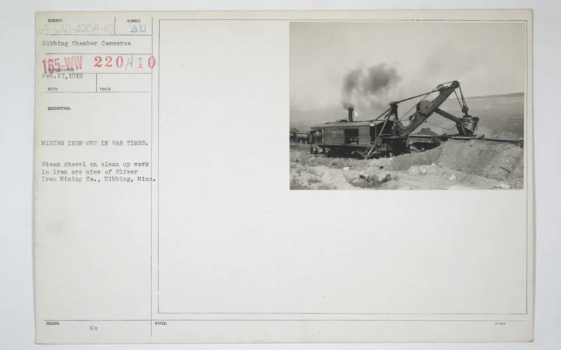 File:Industries of War - Mining - Mining iron ore in war times. Steam shovel on clean up work in iron ore mine of Oliver Iron Mining Company, Hibbing, Minnesota - NARA - 45488438.jpg