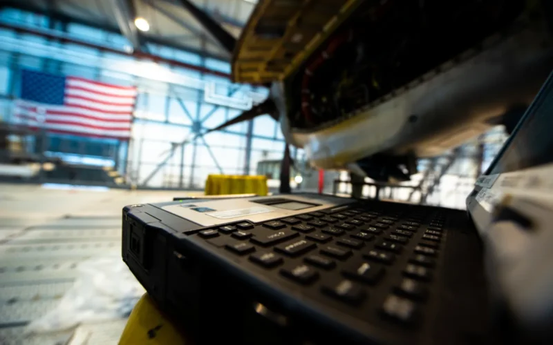 A laptop containing technical orders sits nearby a C-130J Super Hercules aircraft at Ramstein Air Base, Germany, Nov. 16, 2020. Technical orders provide detailed instruction on how to conduct necessary repairs on the aircraft. (U.S. Air Force photo by Airman 1st Class Andrew J. Alvarado)