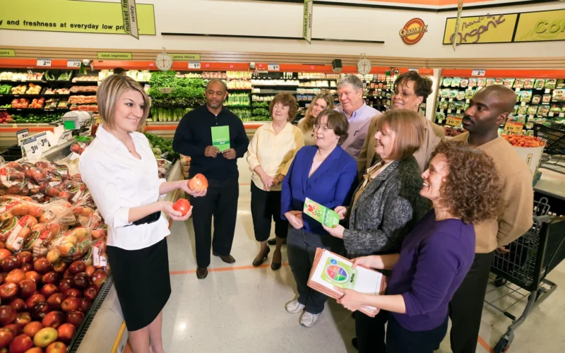 At Shoppers Food Warehouse stores, people can learn better nutrition and ways of living with diabetes through a program called “Eating Healthy With Diabetes.” Registered dietitian and president-elect of the Maryland Dietetic Association Jessica Kiel (left) encourages shoppers to use the U.S. Department of Agriculture’s (USDA) ChooseMyPlate.gov interactive tools, which use USDA Agricultural Research Service (ARS) national nutrient data to make better, healthier food choices on Dec. 28, 2011. USDA photo by Stephen Ausmus.