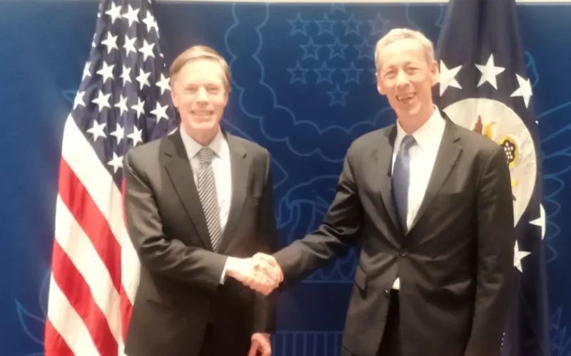 Ambassador Burns and U.S.-China Business Council President Craig Allen shaking hands in front of a blue backdrop, the U.S. and the State Department flags. "U.S.-China Business Council President Craig Allen is a very effective leader at this challenging time. He is a good partner for our U.S. mission. @USChinaBusiness"