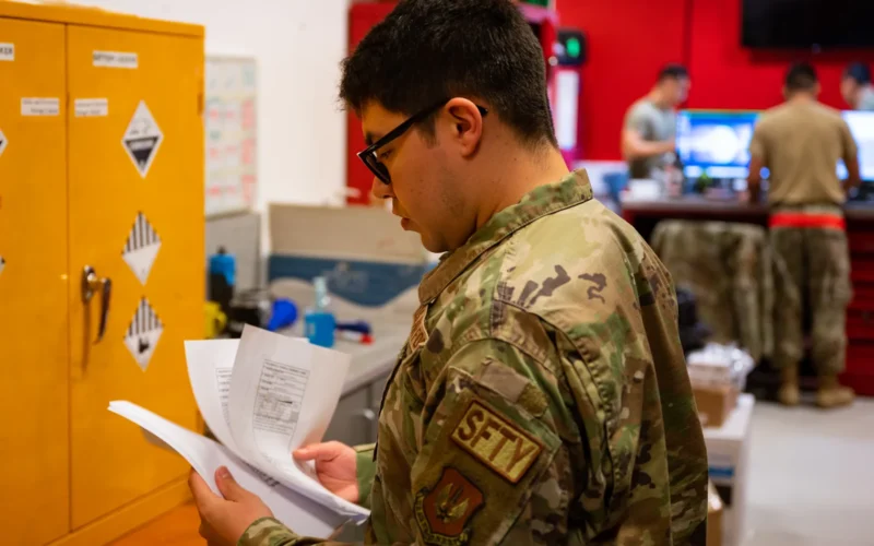 U.S. Air Force Senior Airman Connor Badten, 48th Fighter Wing safety occupational safety technician, verifies safety data sheets and conducts safety checks on hazard communication lockers at RAF Lakenheath, England, June 24, 2024. Occupational safety offers training for supervisors and unit safety representatives, providing activities that assess unit safety programs, information dissemination, facility inspections, and safety expertise in the workplace. (U.S. Air Force photo by Staff Sgt. Gaspar Cortez)