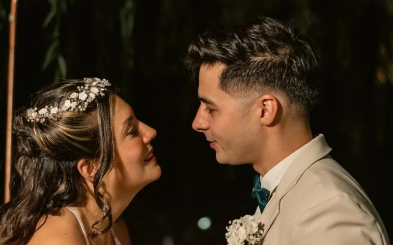 Bride and groom sharing a special moment during their wedding ceremony, capturing a sense of love and joy.