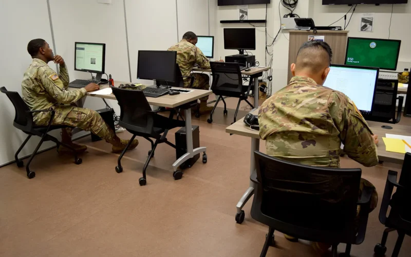 U.S. Soldiers take the Online Academic Skills Course (OASC) at the education center on USAG Benelux-Brunssum, Netherlands, Aug. 18, 2022. The course is designed to help Soldiers and their Families improve academic skills and increase their scores on standardized tests such as the Armed Forces Classification Test (AFCT). (U.S. Army photo by Sandra Wilson, USAG Benelux Public Affairs)