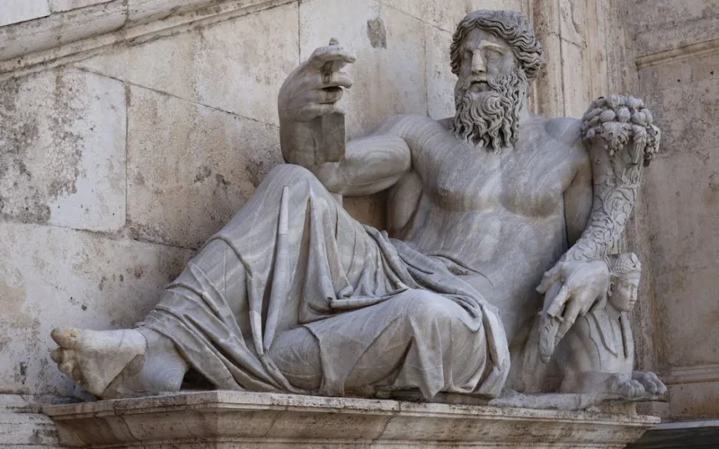 Intricate marble sculpture showcasing Roman heritage at an ancient site in Rome, Italy.