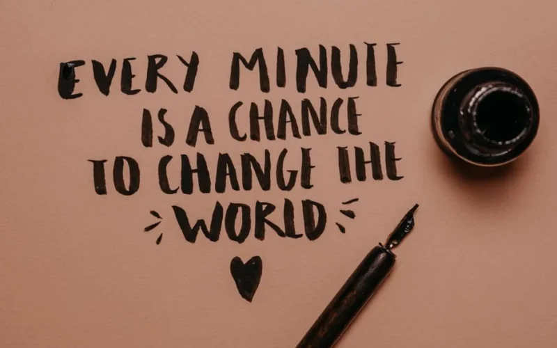 A motivational quote handwritten with a fountain pen, inspiring change and positivity.