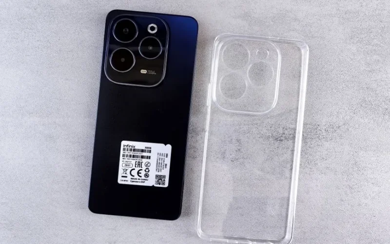 Top view of Infinix Hot 40 Pro smartphone with transparent clear case on a light background.